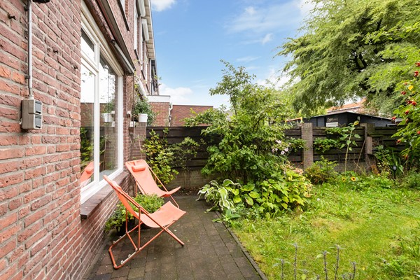 Foto - Te koop: Sfeervolle tussenwoning met groene oase!